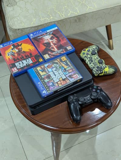 ps4 slim 500 Gb with games and extra controller