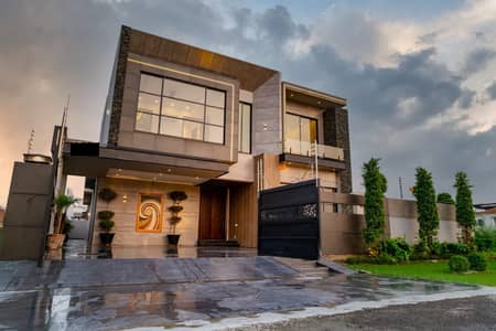 One Kanal Brand New Luxury Ultra-Modern Design Most Beautiful Bungalow 2 Servant Quarter In Basement For Sale At Prime Location Of DHA Lahore Near To Park Masjid & Commercial Market.