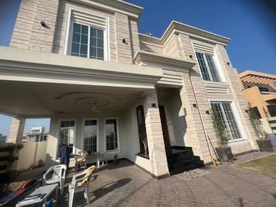 One Kanal Brand New Luxury Ultra-Modern Design Most Beautiful Full Basement 8-Bedroom Swimming Pool Bungalow For Sale At Prime Location Of DHA Lahore Near To Park Masjid & Commercial Market.