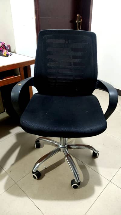 Computer table with rotating chair