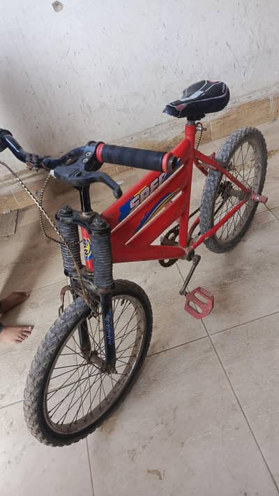 Red & black used cycle for sale. ( reasonable price)