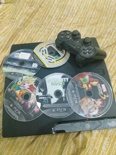 Sony Ps 3 with (1) console, (5) games