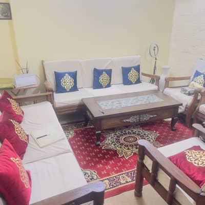 10 seater sofa with center table and cushions