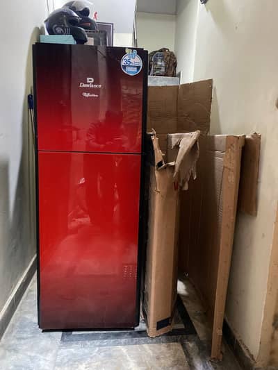 03268554147 Brand New condition dowlance fridge only 1 moth