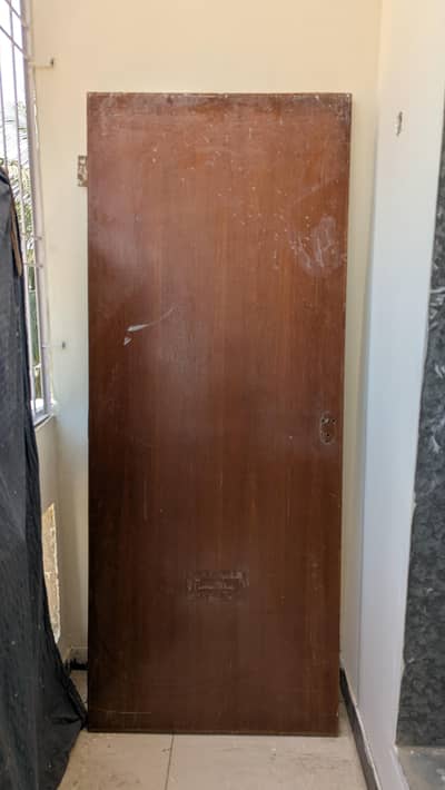 Heavy wooden door