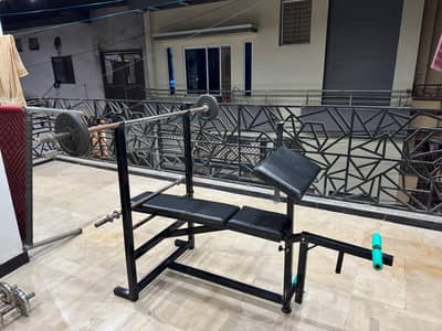 Gym bench, dumbells and rods