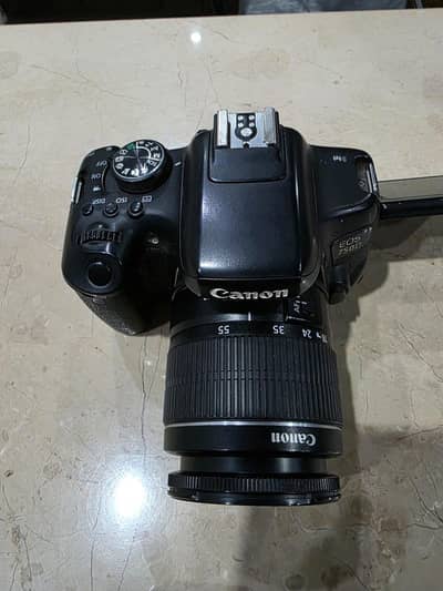 canon 750 Dslr camera with 18-55mm lens condition for sale beraly used