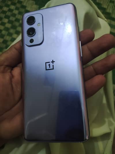 One plus 9 dual SIM 8/118  pta approved just lines can c in pic