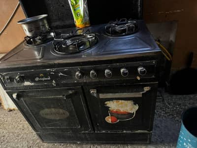 3Burner gas cooking range with double oven good condition