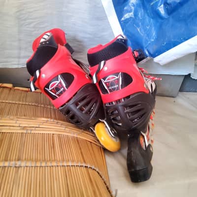 Adjustable Black & Red STAR Roller Skates (Size 41–44) – Used