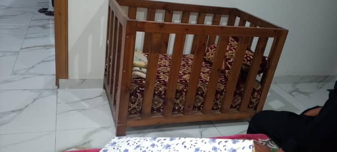 wooden baby bed