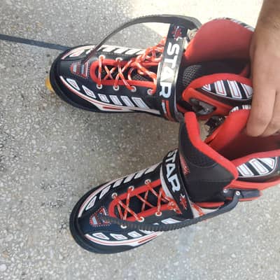 Adjustable Black & Red STAR Roller Skates (Size 41–44) – Used – 8000