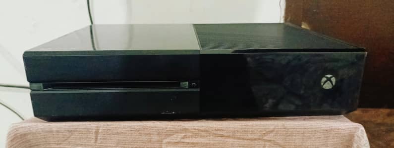 Xbox one with games and wireless controllers