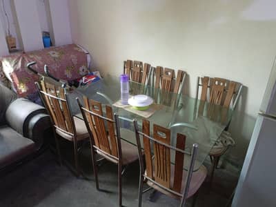 Glass dinnning table with sex chairs