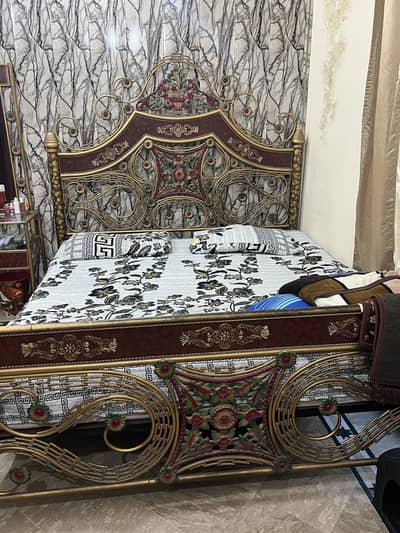 Iron bed with dressing, side tables and 2 room chairs