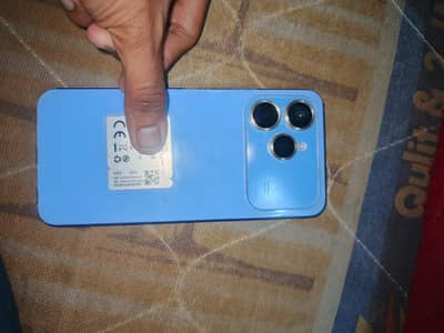 bilkul ok h mob daba charger sab kuch ha  back pa pani lagi we h