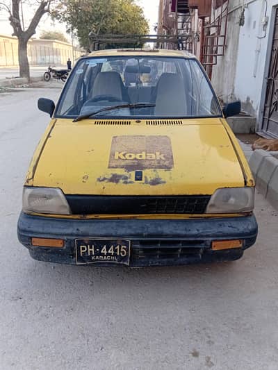 Suzuki Mehran yellow cab taxi 0/3/1/7/2/5/2/0/0/8/2