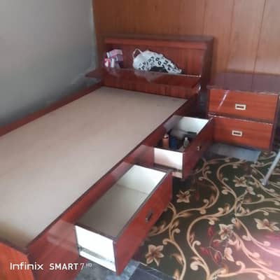 Single bed with side table. (03328914104)