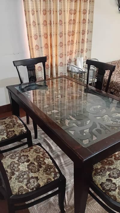 6 seater solid wooden dining table with glass top