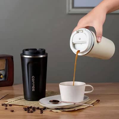 Insulated travel coffee mug
