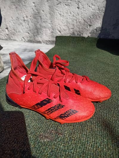 'Original adidas football shoes'.