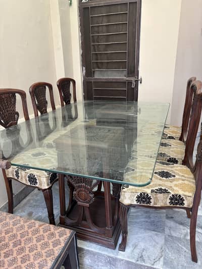 6 chair plus glass table . . .