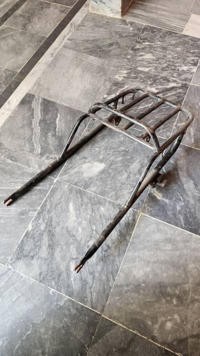 Trail bike rear carrier with lock