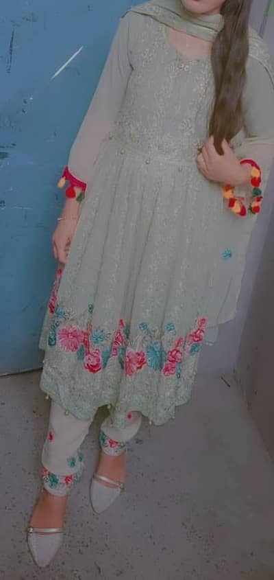 Net Frock along with lilen trouser and net dupatta