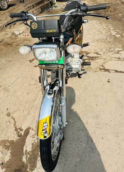 125 self start black golden