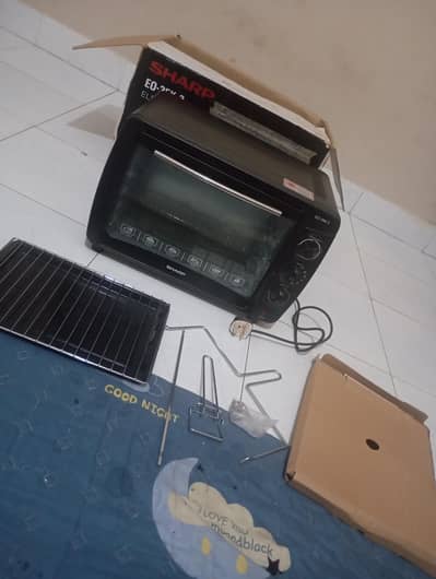 Sharp brand oven used only one time urgent sale
