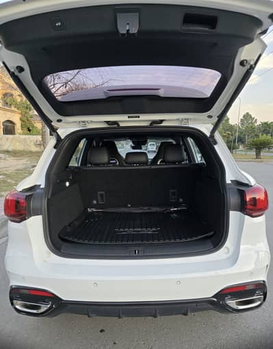 Almost New MGHS PHEV White. Call 03235313580