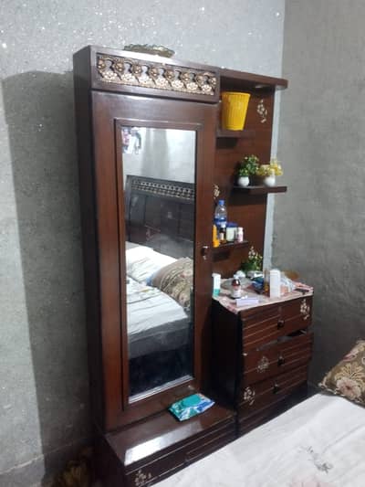 Wood Showcase, dressing table,and side tables in good conditiofor sale