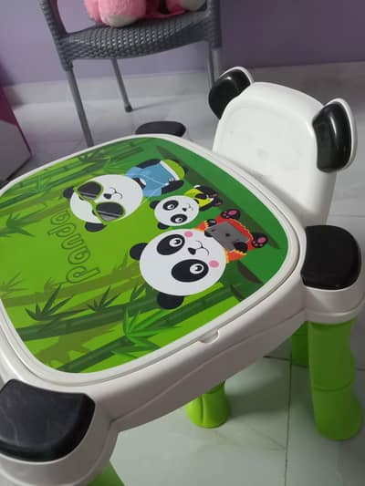 green and white table and a chair