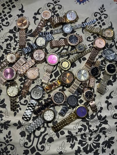 MICHAEL KORS, DIOR, CHANEL, GUCCI, SWAROVSKI, GUEES