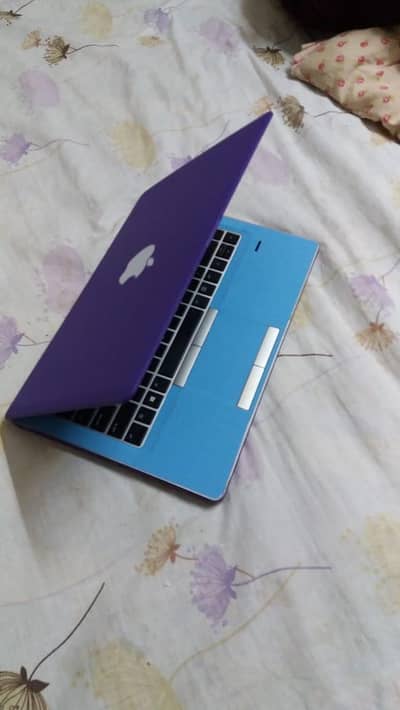 HP Folio 9470 Core i5.8GB and 320GB.