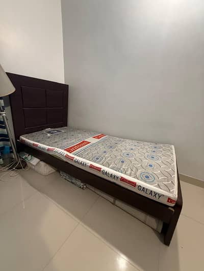 Two single size beds