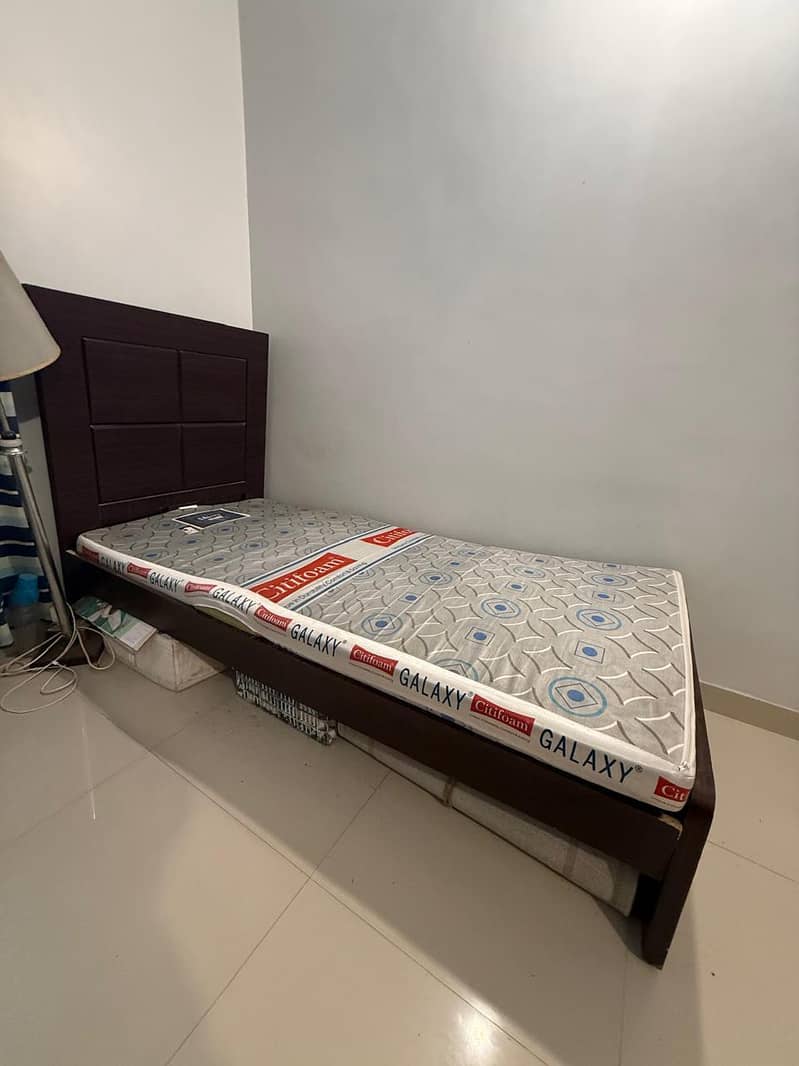 Two single size beds 0