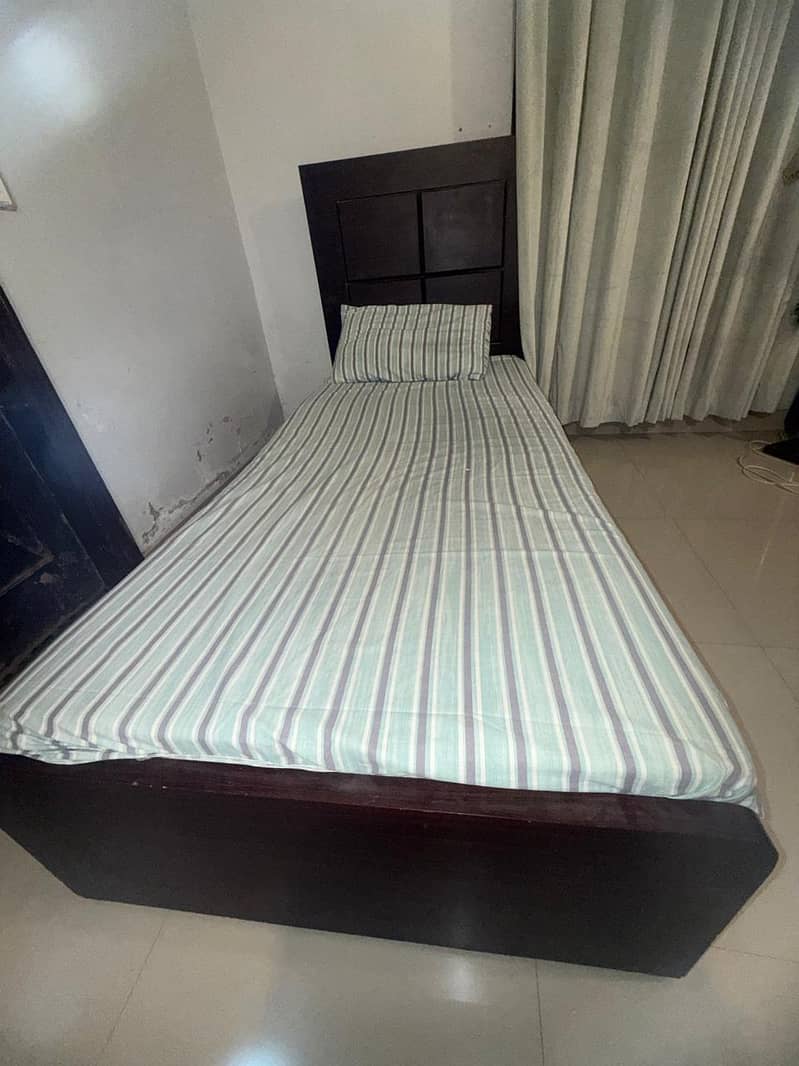 Two single size beds 3