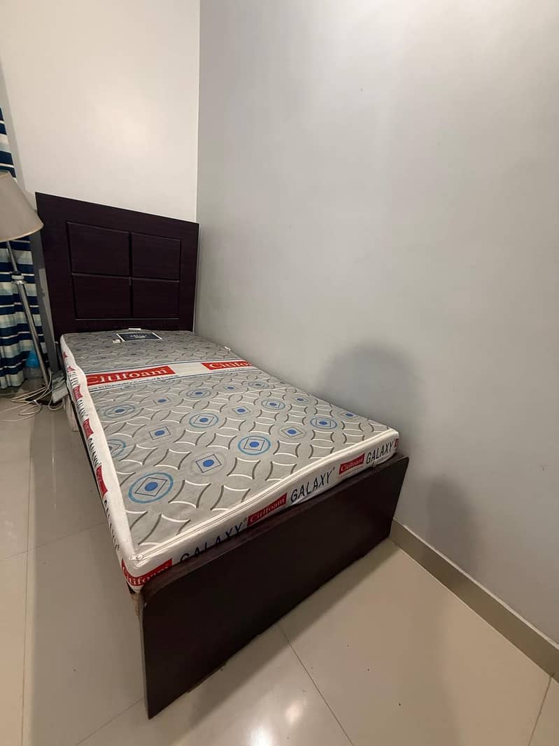 Two single size beds 5