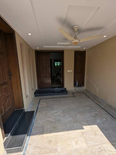 D block near park house