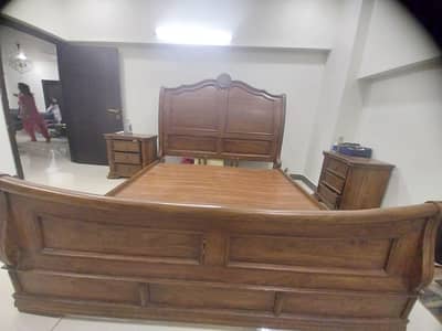 slightly used wooden bed