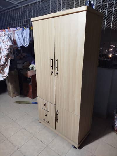 2 door wardrobe 3ft with wheels.