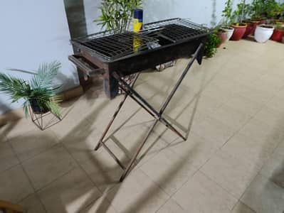 BBQ Grill with folding stand