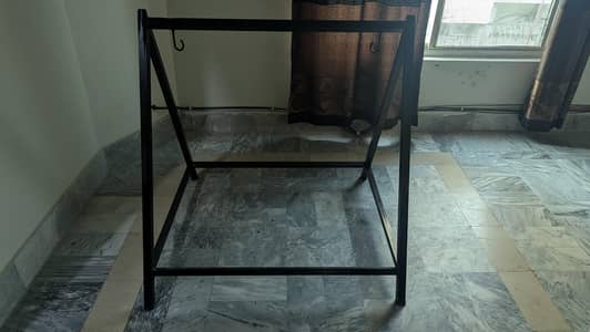 black metal jhola stand