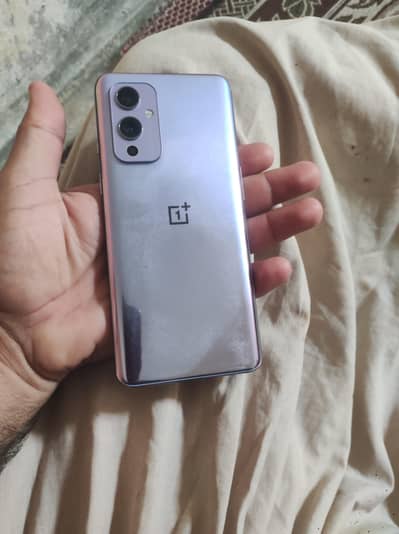 One plus 9 dual SIM 5G 8/128  pta approved just lines can c in pic