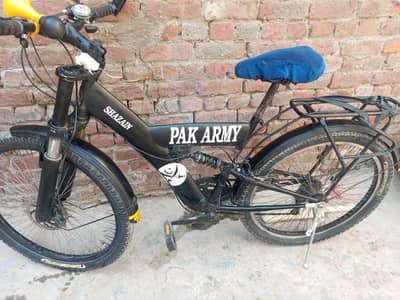 26 inch bicycle mountain black and 18 inch baby bicycle red