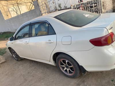 toyota corolla 2008/2009 Xli white Lahore registered