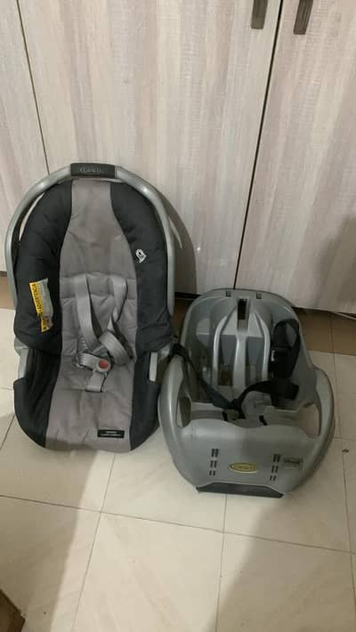Carry cot and car seat