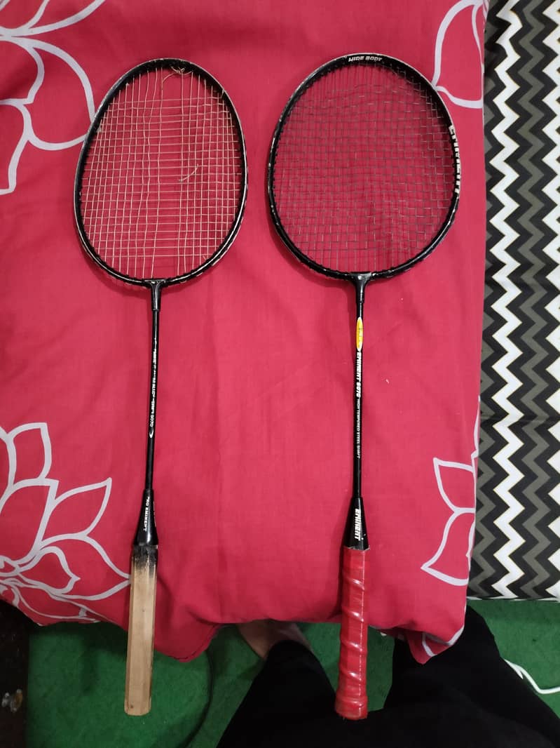 2 Rackets 1