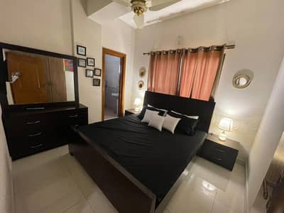 2 bedrooms apartment luxury furnished available for rent location E-11 Islamabad